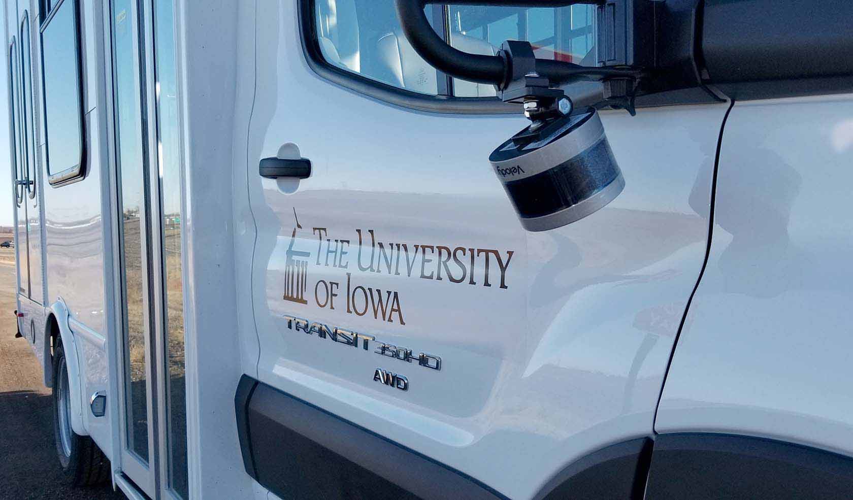 Close up of side of bus showing lidar